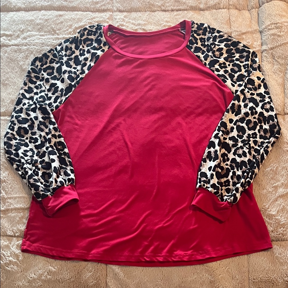 Stylish Women's Red Top with Animal Print Sleeves